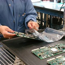 Populated printed circuit boards after they have completed the assembly process.